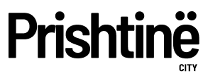 Black silhouette of the Prishtina city skyline with landmarks and building outlines.